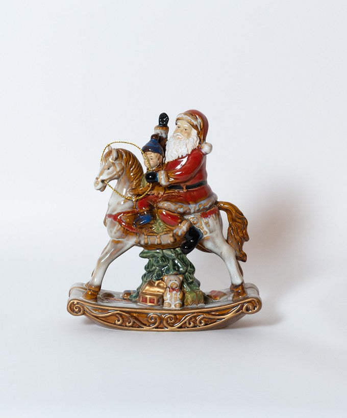 STATUINA BABBO NATALE A CAVALLO CON BAMBINO