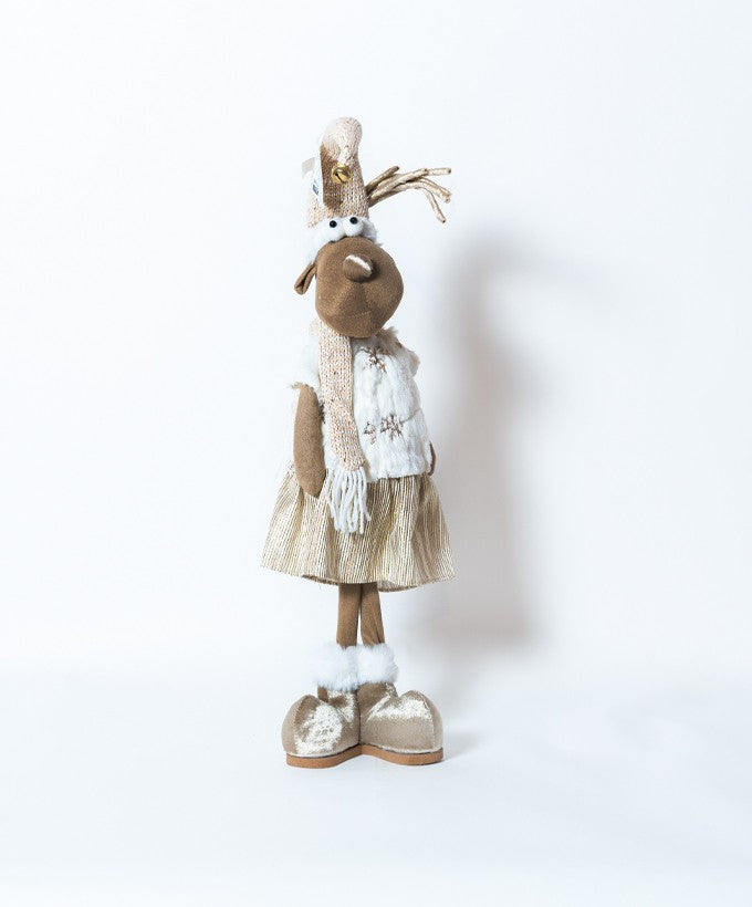 RENNA ELEGANTE IN PIEDI CON ABITO BEIGE